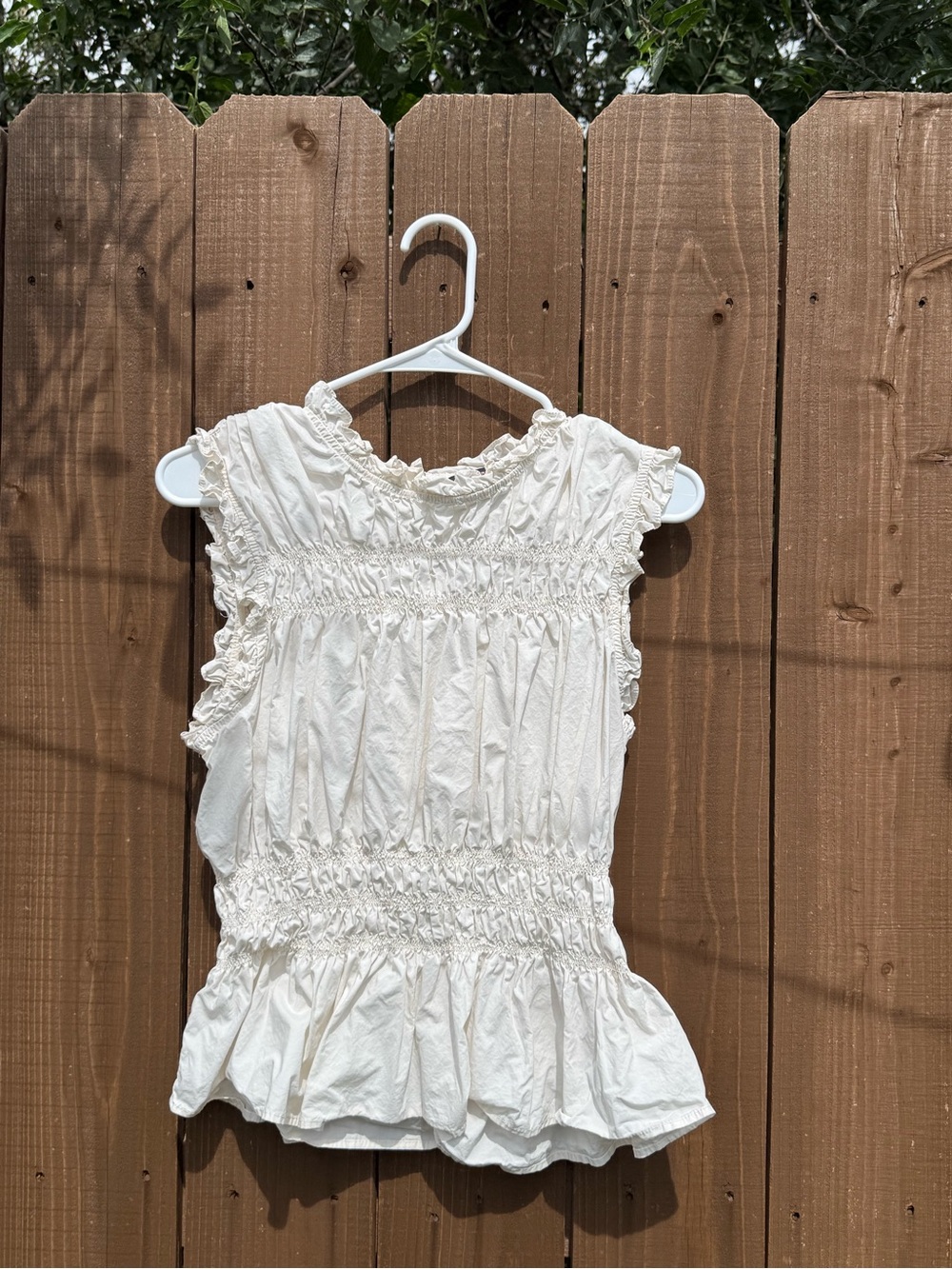 Skies Are Blue Cream Smocked Ruffle Sleeveless Top